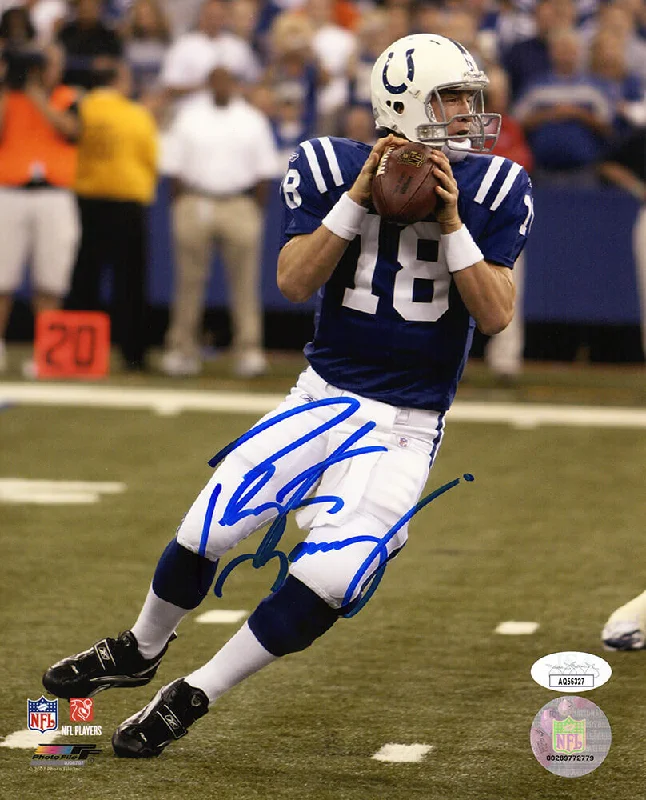 Peyton Manning Signed Indianapolis Colts Blue Jersey Drop Back Action 8x10 Photo - (JSA COA)